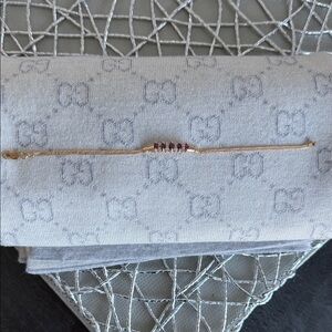 Gold Bracelet with Ruby Accents